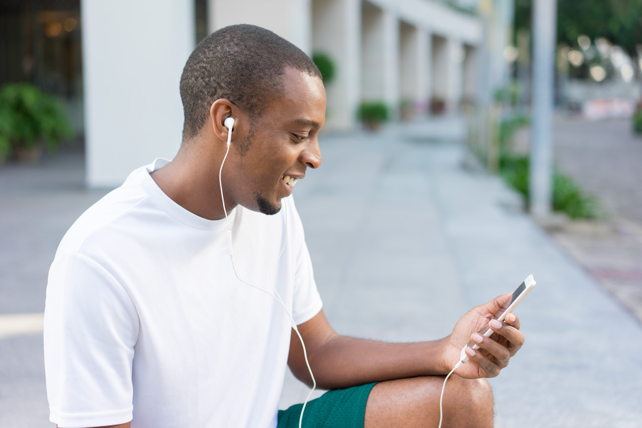 Man relaxing and enjoying music on Waves Radio